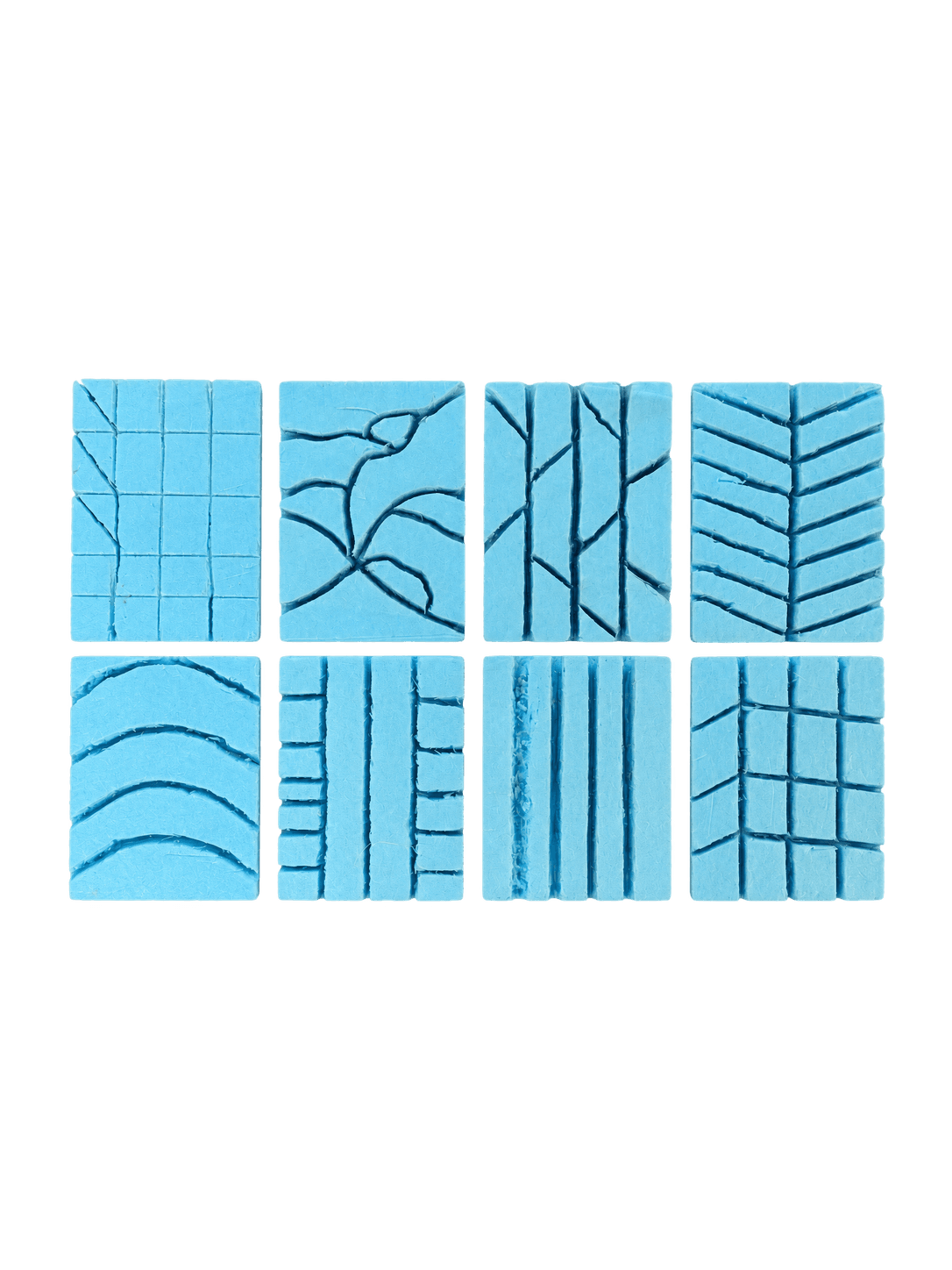 Eight physical foam samples testing alternative drainage-channel patterns